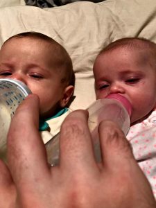 feeding two babies one handed