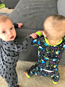 babies learning to stand