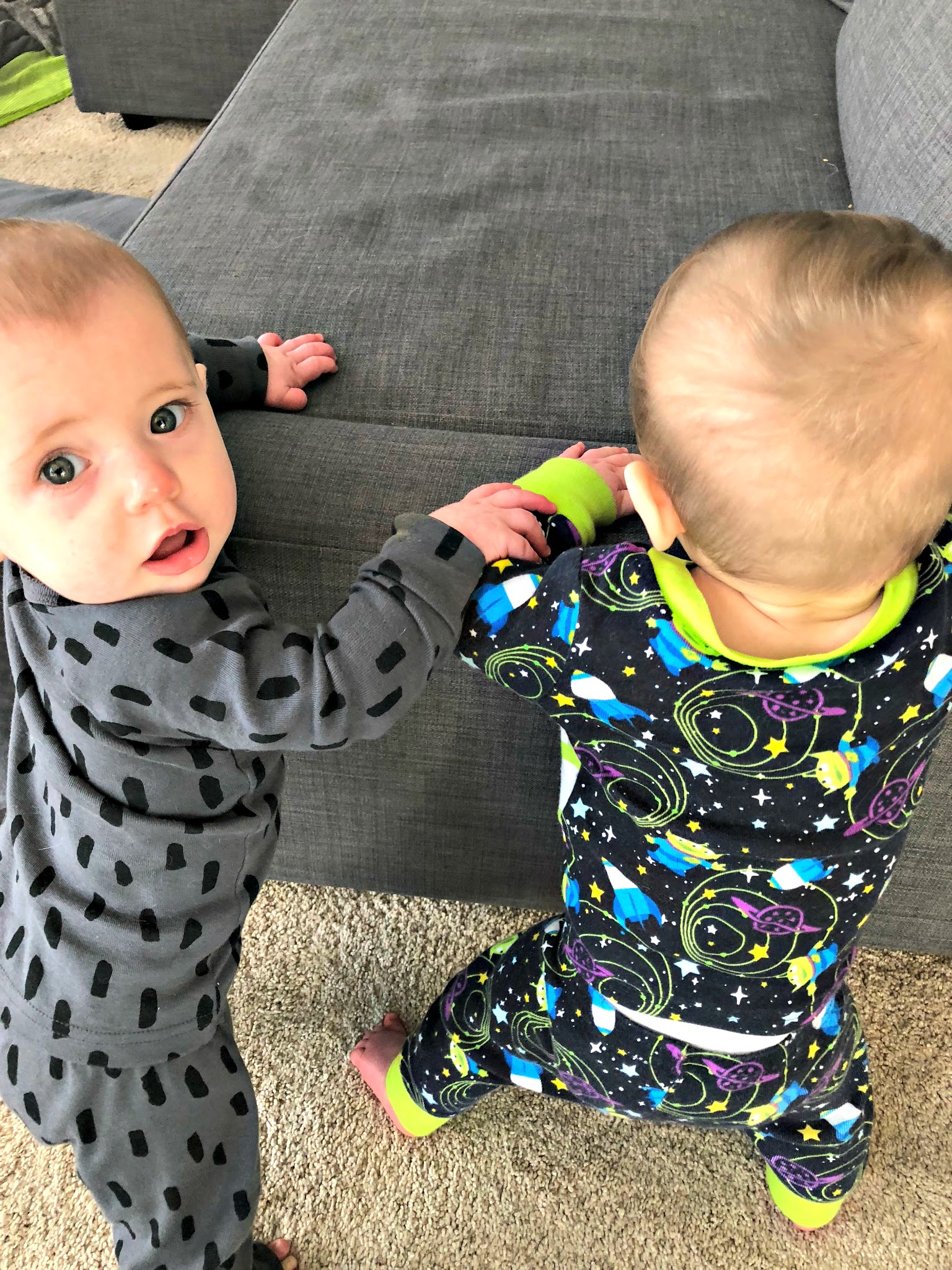babies learning to stand