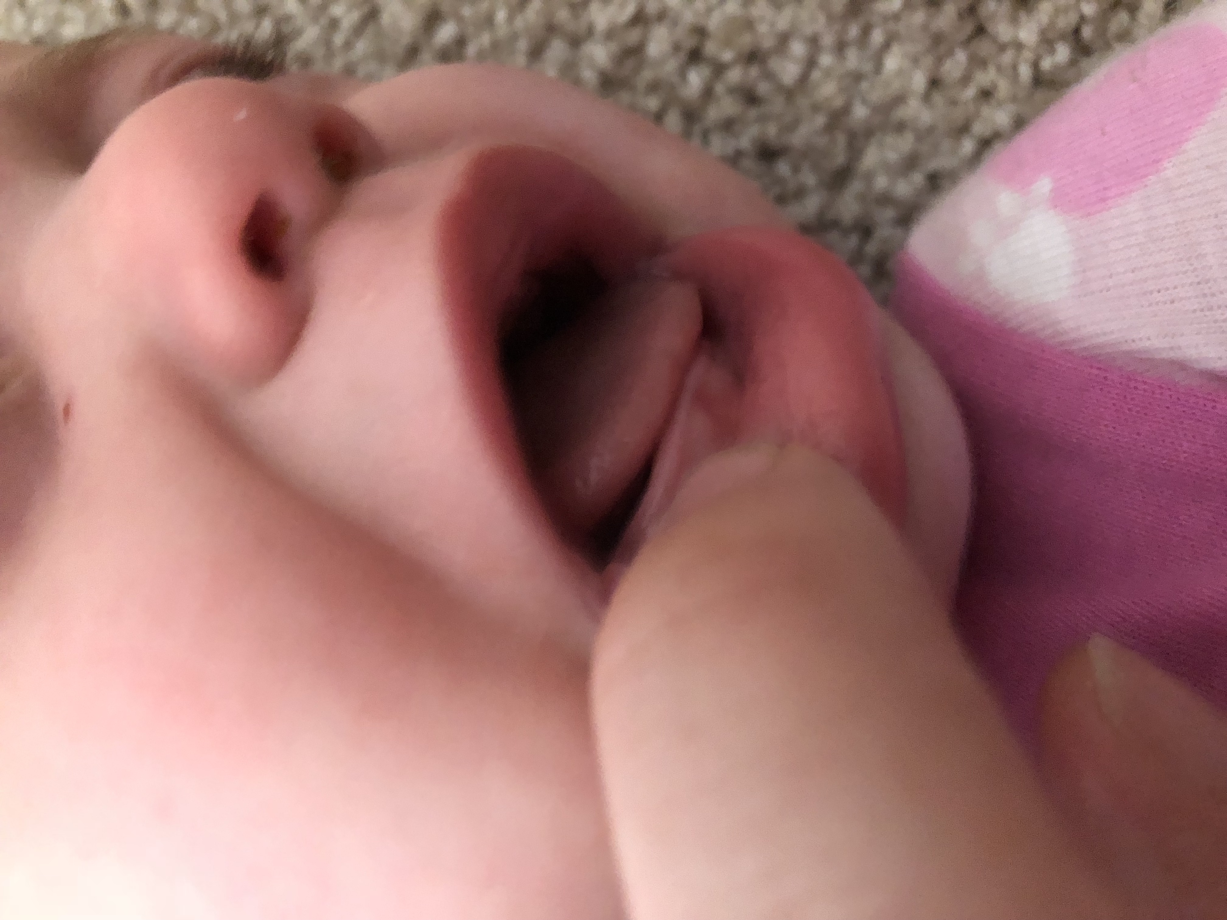 baby's first tooth coming in