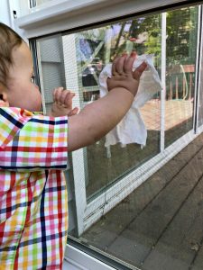 baby wiping window