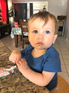 toddler at kitchen island