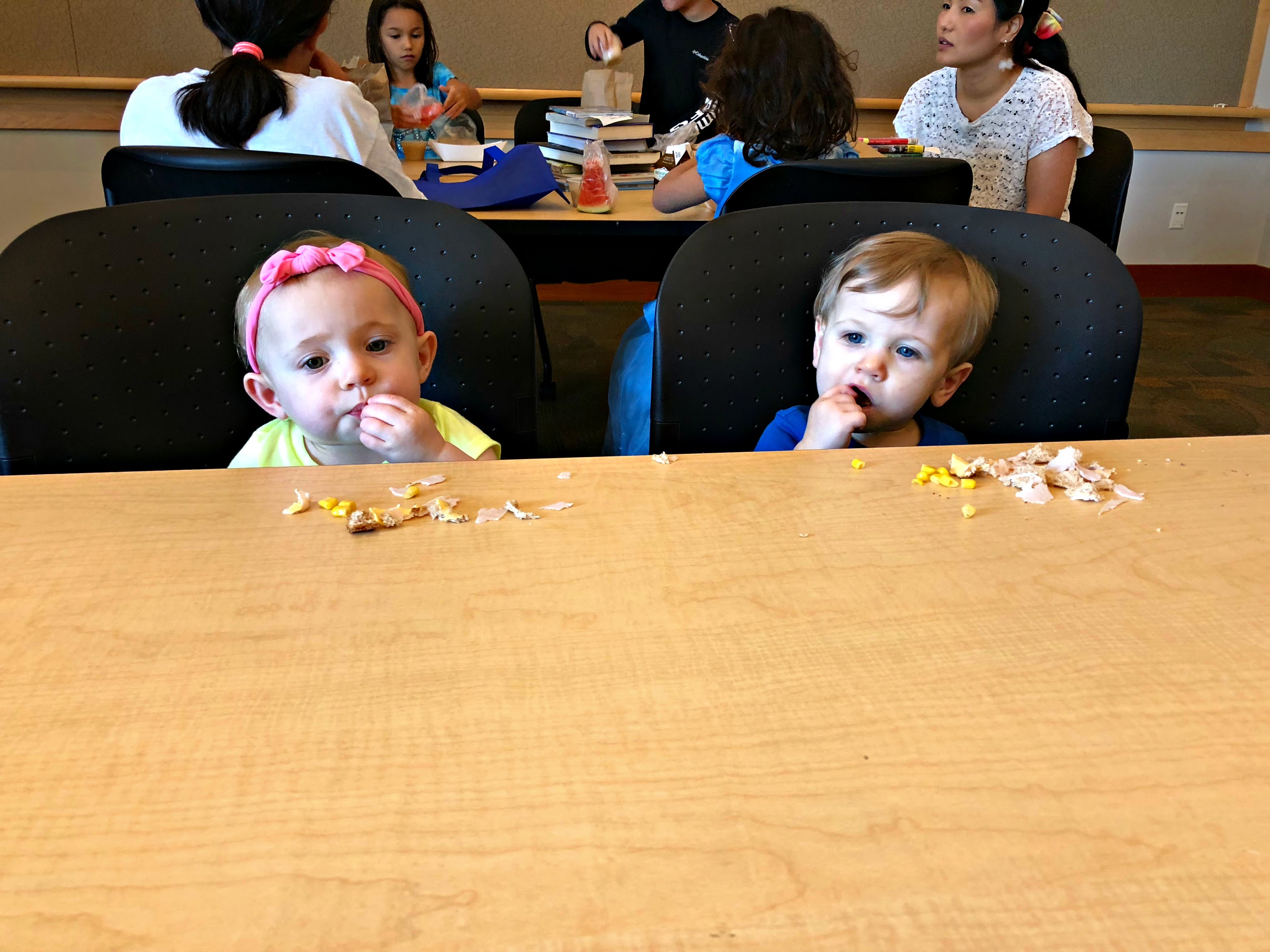 twins eating sandwich